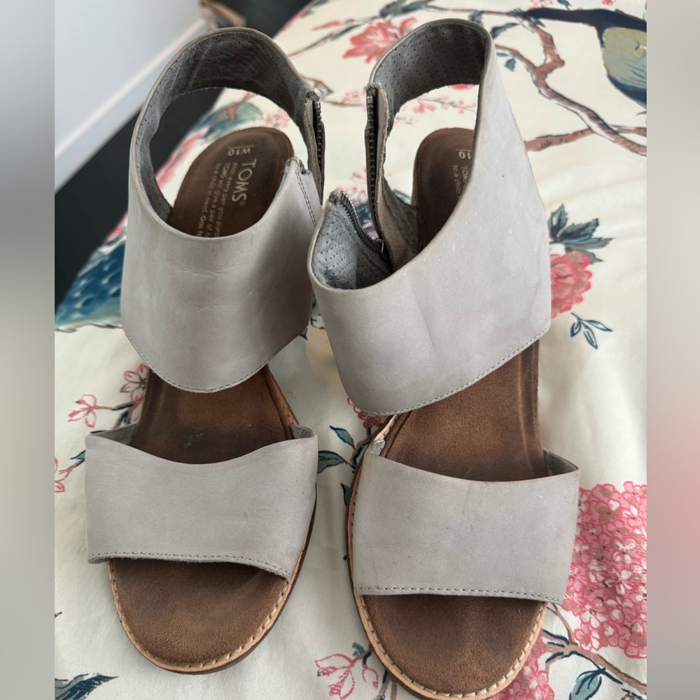 Tom’s Sandals. Used but life left. Size 10. Priced to sell. Color is a grayish